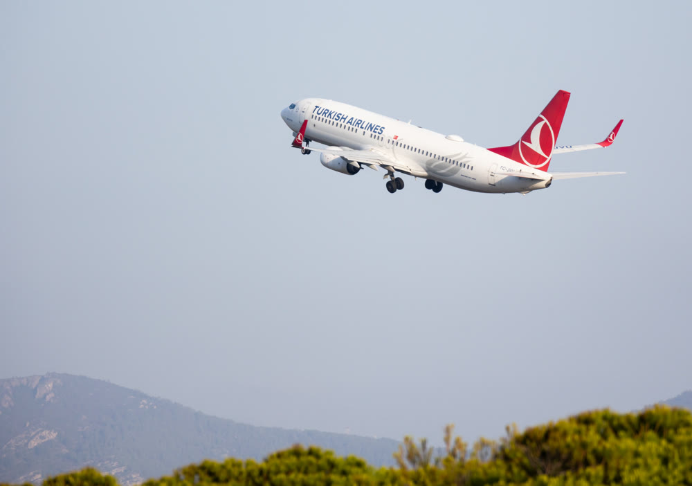 SPAIN, BARCELONA - AUGUST 18, 2023: Turkish Airlines Boeing 737 airplane takes off from Barcelona