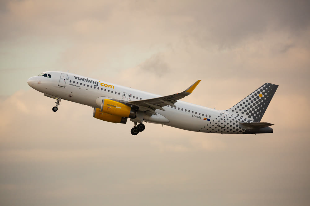 Takeoff of Vueling Airbus EC-MQE from El Prat Airport