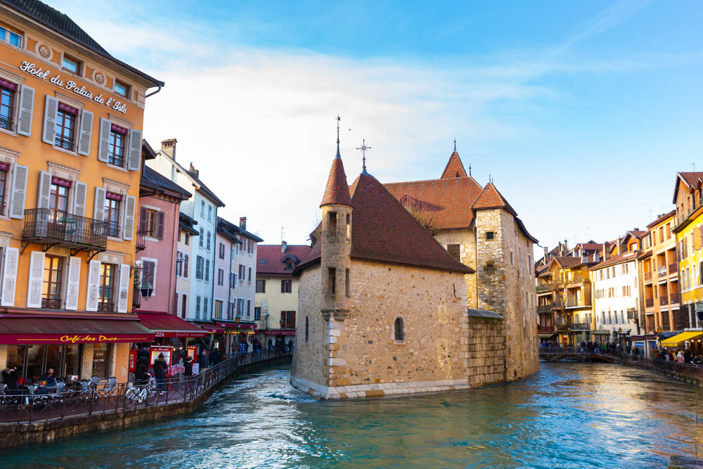 Annecy, France - December 30, 2021: Picturesque houses on the banks of Tew Canal in Annecy. France