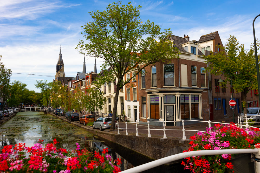 Delft, Netherlands - August 07, 2022: Picturesque streets, architecture and canals of Delft
