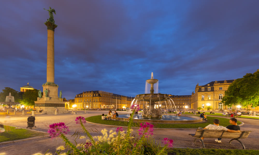 Evening cityscape of Historic Schlossplatz central square featuring Jubilee Column