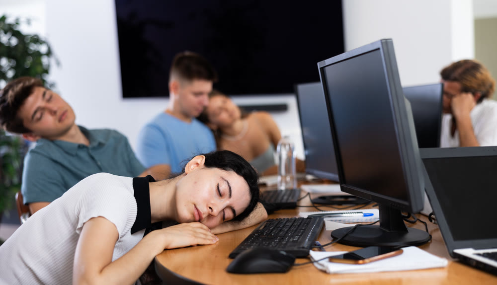 Exhausted students find solace in sleep