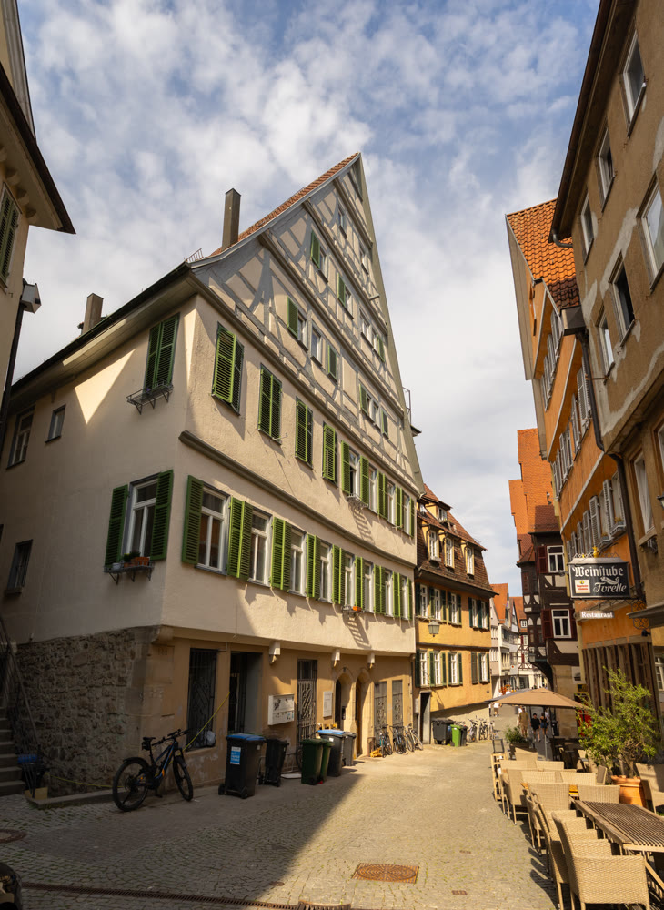 Street with traditional timber-framed houses in old town of Tubingen
