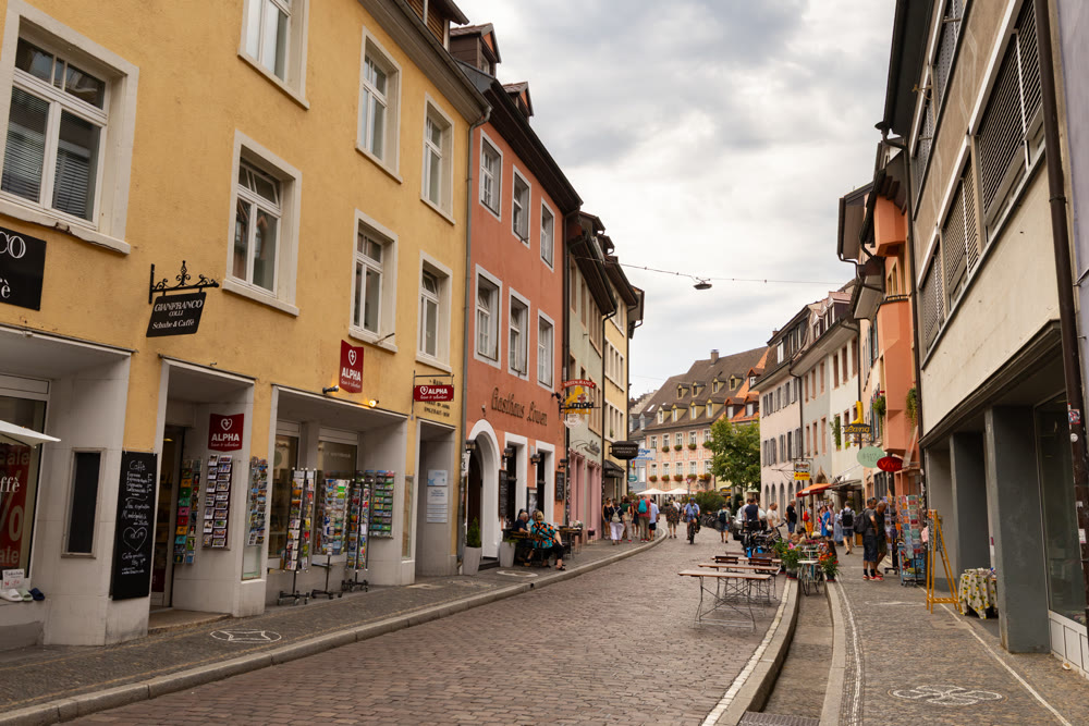 Street scene with historic architecture in own Freiburg im Breisgau