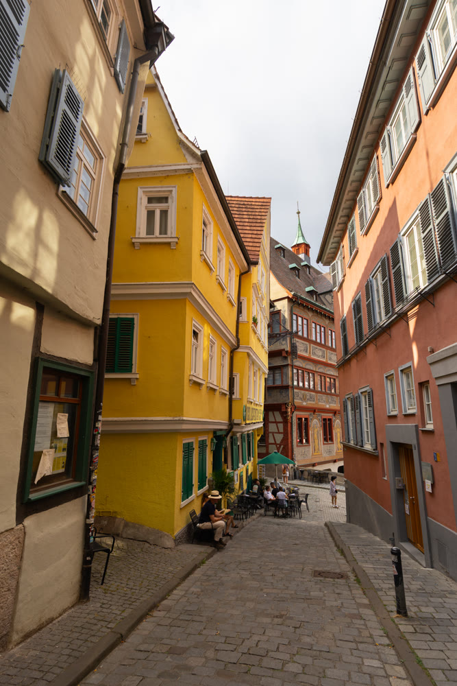 Street with traditional timber-framed houses in old town of Tubingen