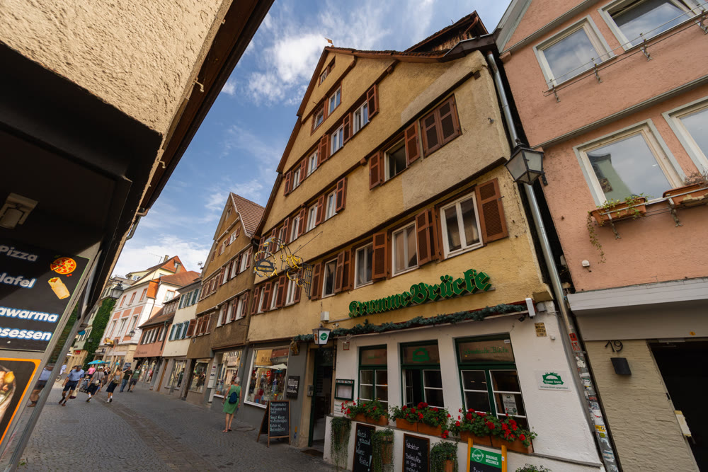 Street with traditional timber-framed houses in old town of Tubingen