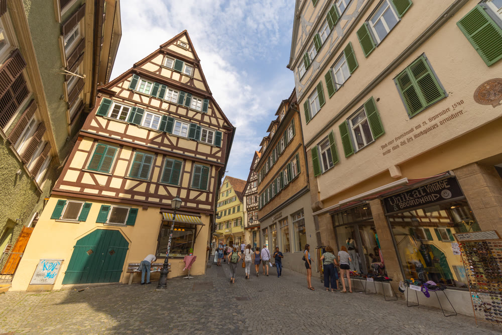 Street with traditional timber-framed houses in old town of Tubingen