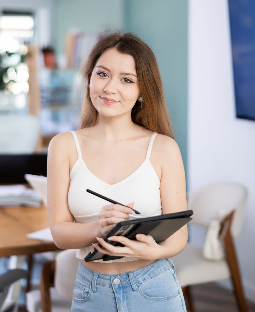 Female secretary preparing for meeting with colleagues
