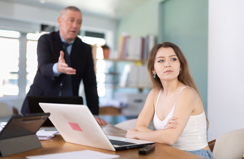Boss scolding at office employee