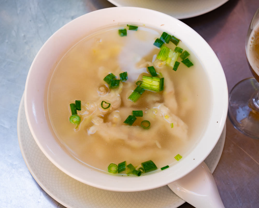 Fish meatball soup with green onions. Chinese cuisine