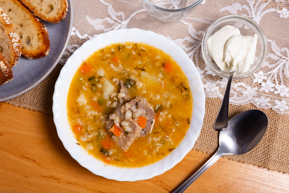 Rassolnik: popular Russian soup with pickled cucumbers, brine and pearl barley