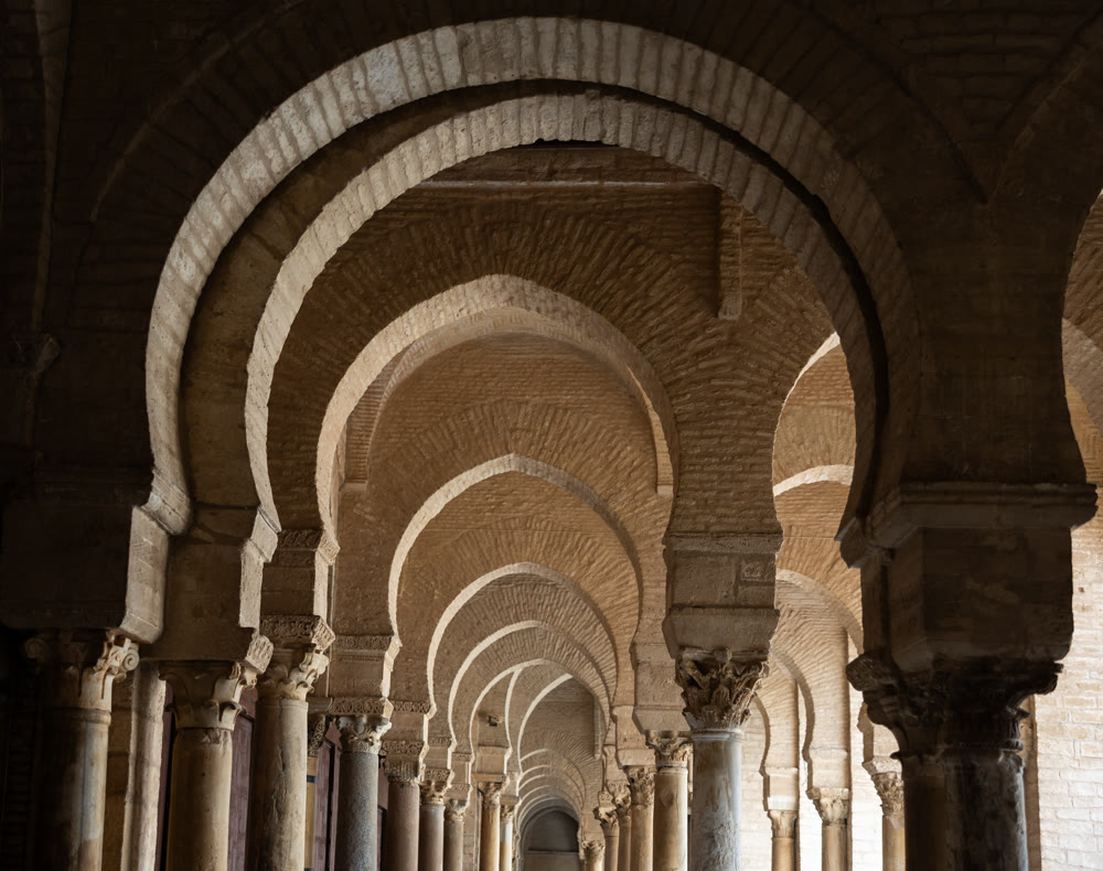 Old Roman colonnade supporting patio around courtyard in Great Mosque of Kairouan, Tunisia