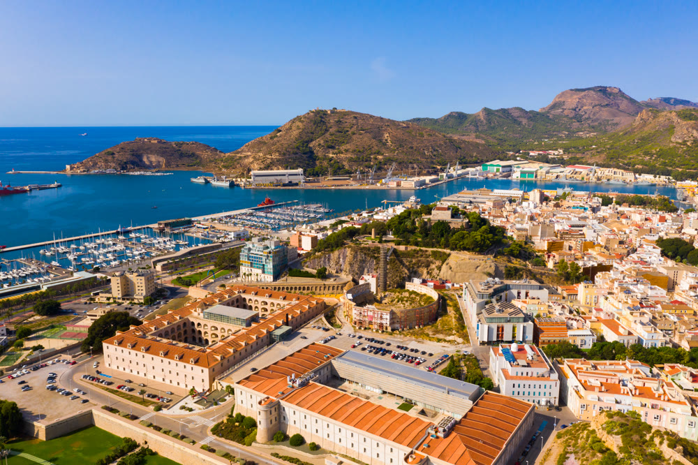Aerial view of Cartagena port city with buildings and coast line, Murcia
