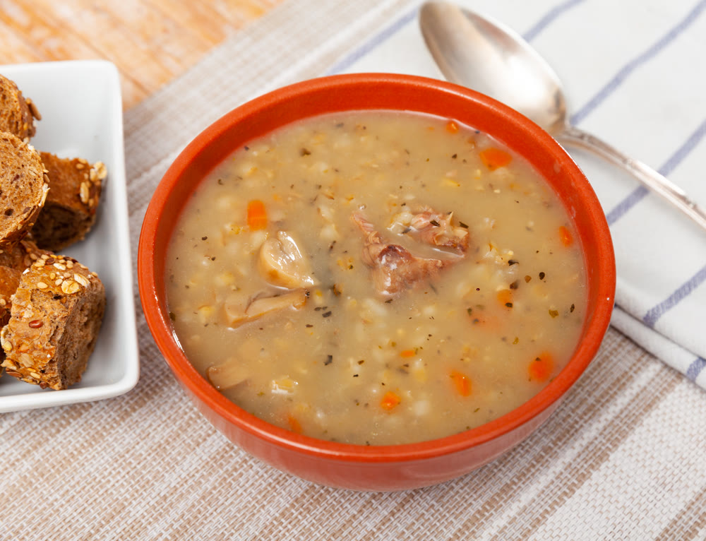 Pork and mushroom soup with vegetables and pearl barley