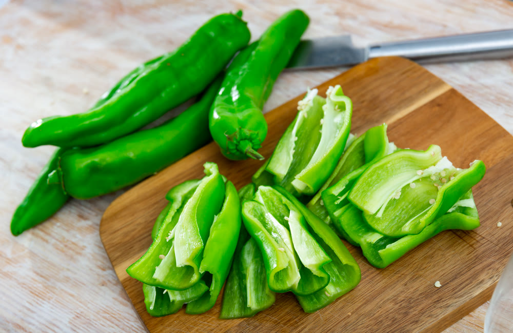 Chopped green pepper on kitchen table