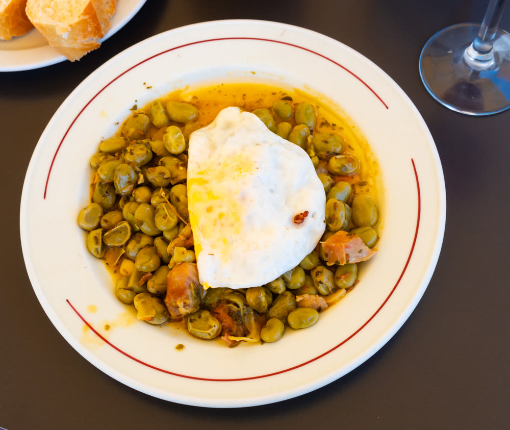 Spanish beans with egg in a plate