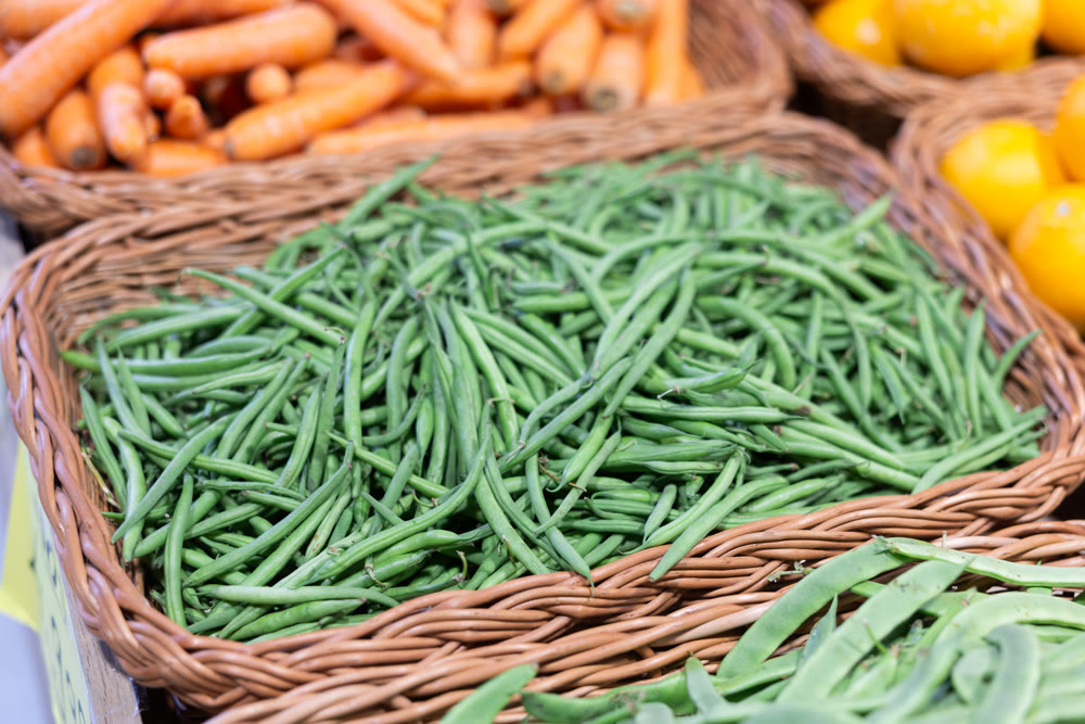 Pile of green beans displayed at market