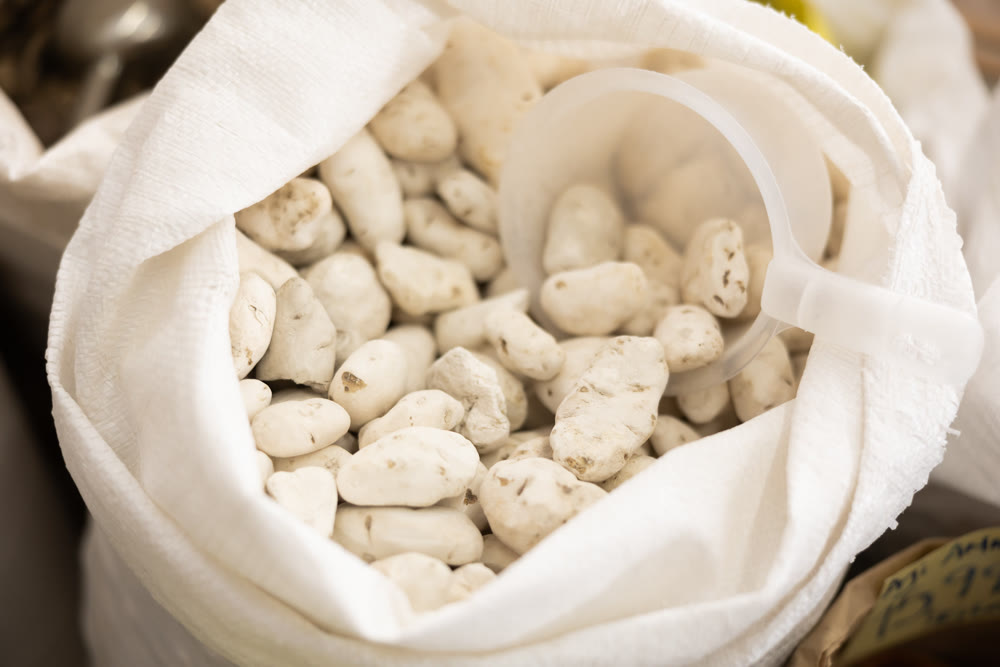 White chuno or black chuno in sack