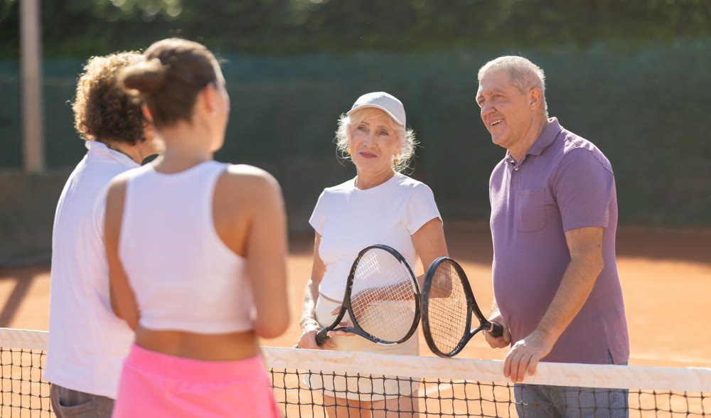 group of friends chatting after playing tennis