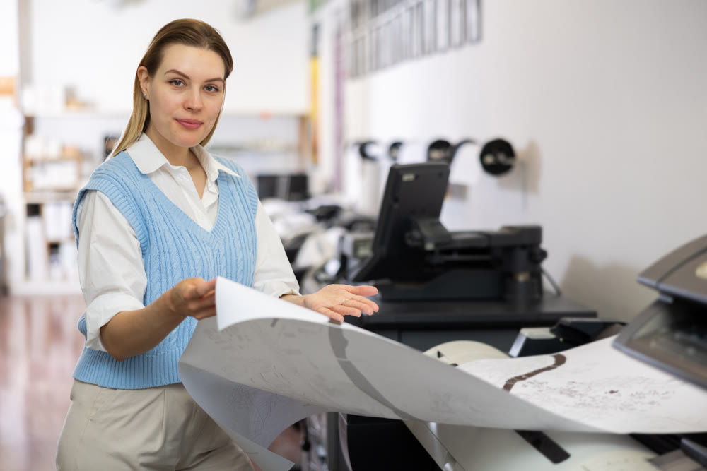 Woman working in publishing facility