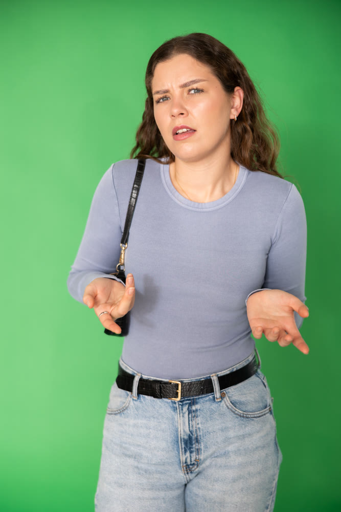 Discouraged or puzzled female person is trying to recall necessary information