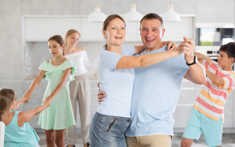 Big family dancing together