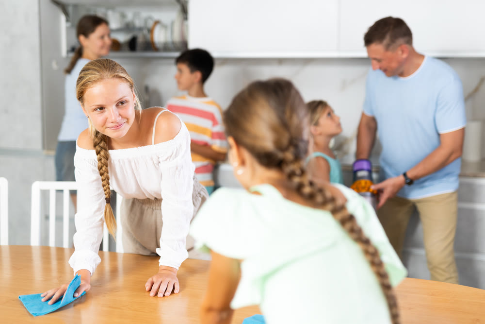 Big family members cleaning their house