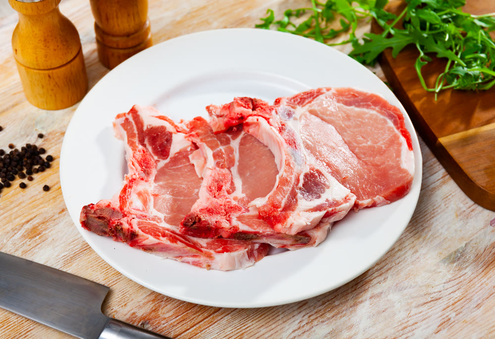 Fresh uncooked loin pork chops