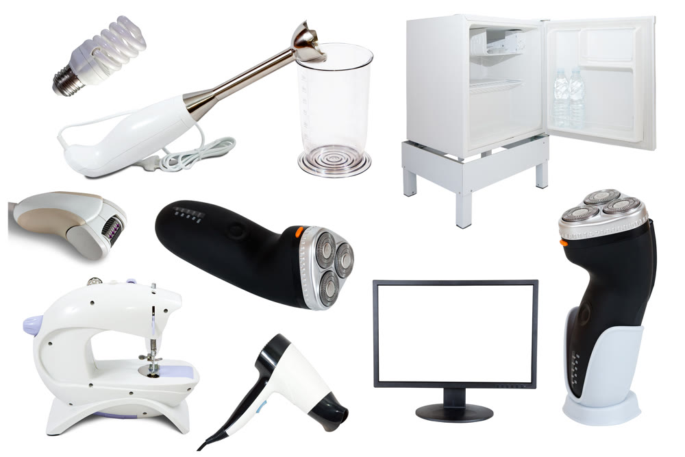 Assortment of household appliances isolated on white background