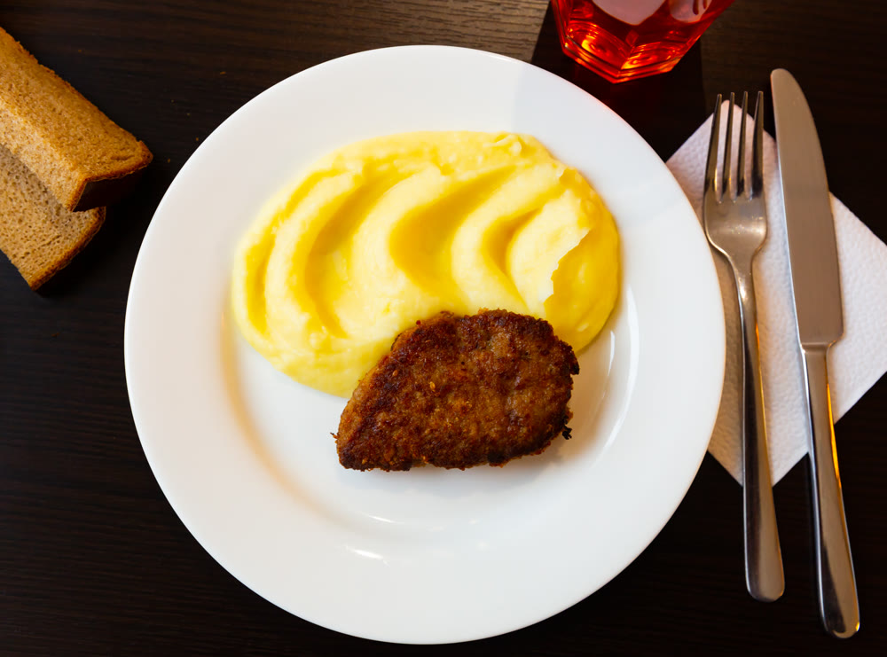 Roasted pork patty served with mashed potato