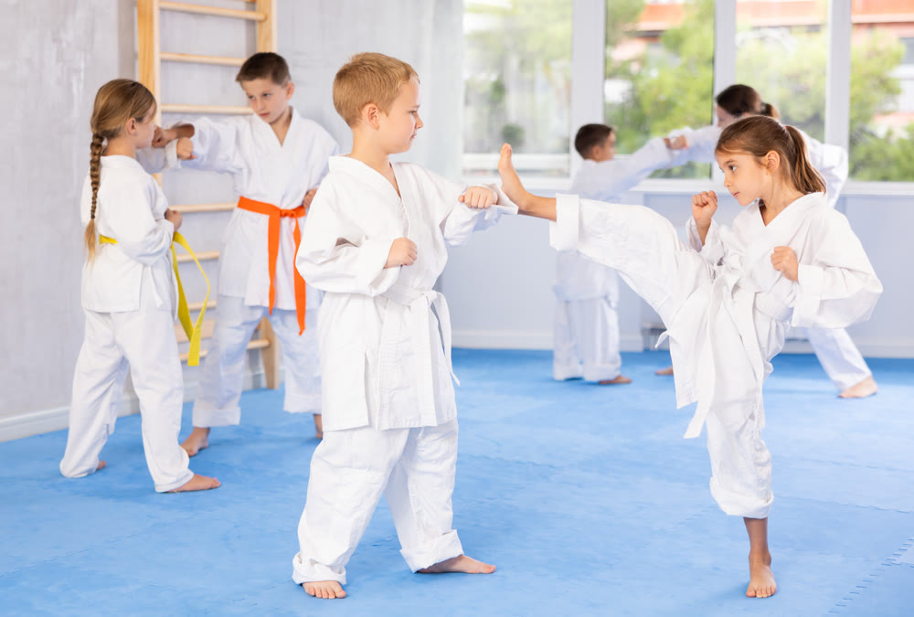 Karate students engage in sparring