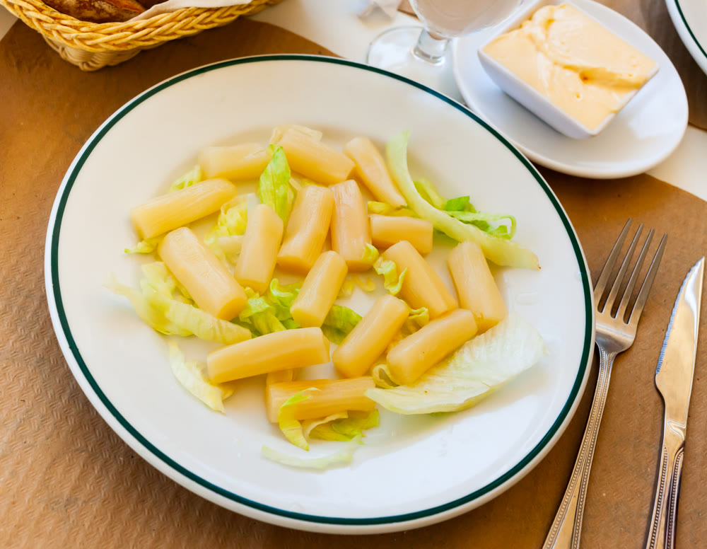 Vegetarian dish boiled asparagus served with mayonnaise