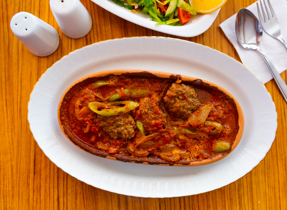 Izmir kofte - Turkish traditional meatball with chickpeas and sauce