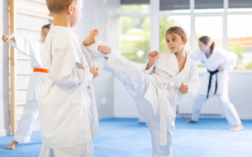 Karate students engage in sparring