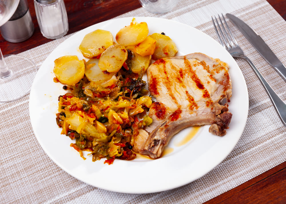 Pork with potatoes and stewed cabbage