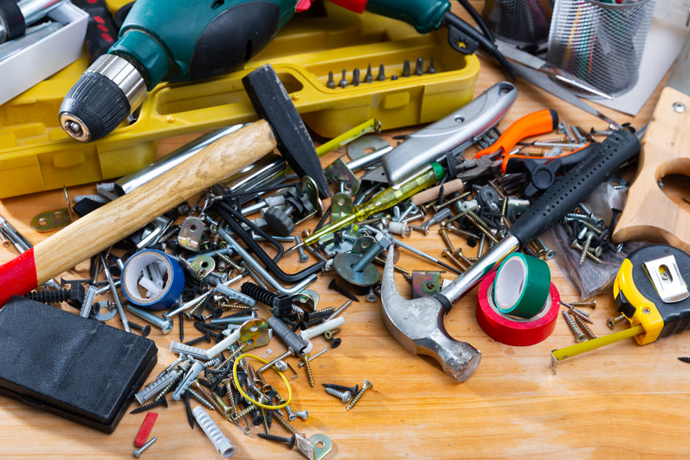 Repair tools on wooden background