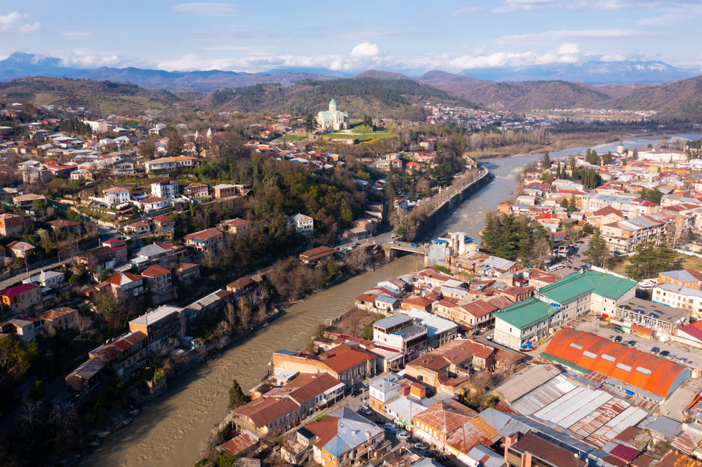 View from drone of historical districts of Kutaisi with Bagrati Cathedral