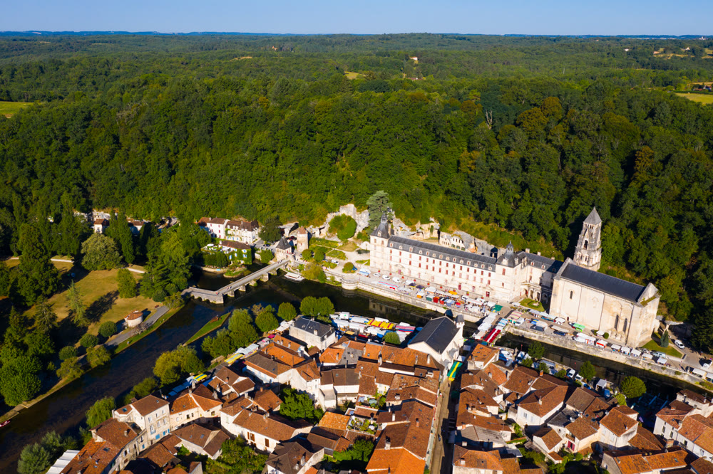 Drone view of Brantome en Perigord on Dronne river in summer, France