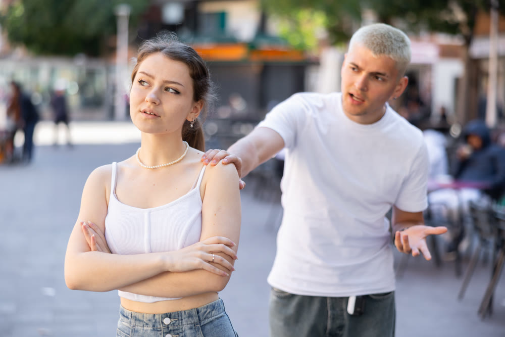 guy and his girlfriend quarreled on the street