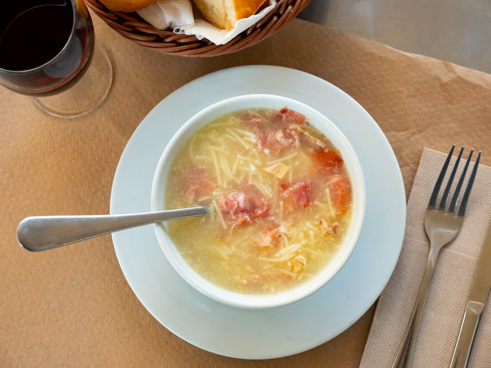 Soup with noodles and minced meat. Hearty lunch